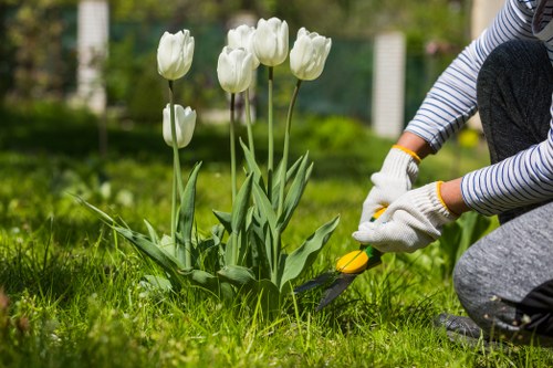 Hoxton gardener preparing tools in urban garden